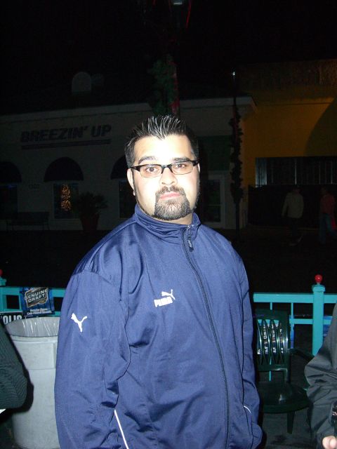 1996 Ford Probe - A man wearing a blue Puma jacket and glasses is pictured outdoors at night.