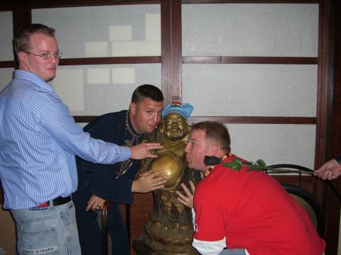 1996 Ford Probe - A group of friends pose with a statue, creating a humorous and memorable moment.