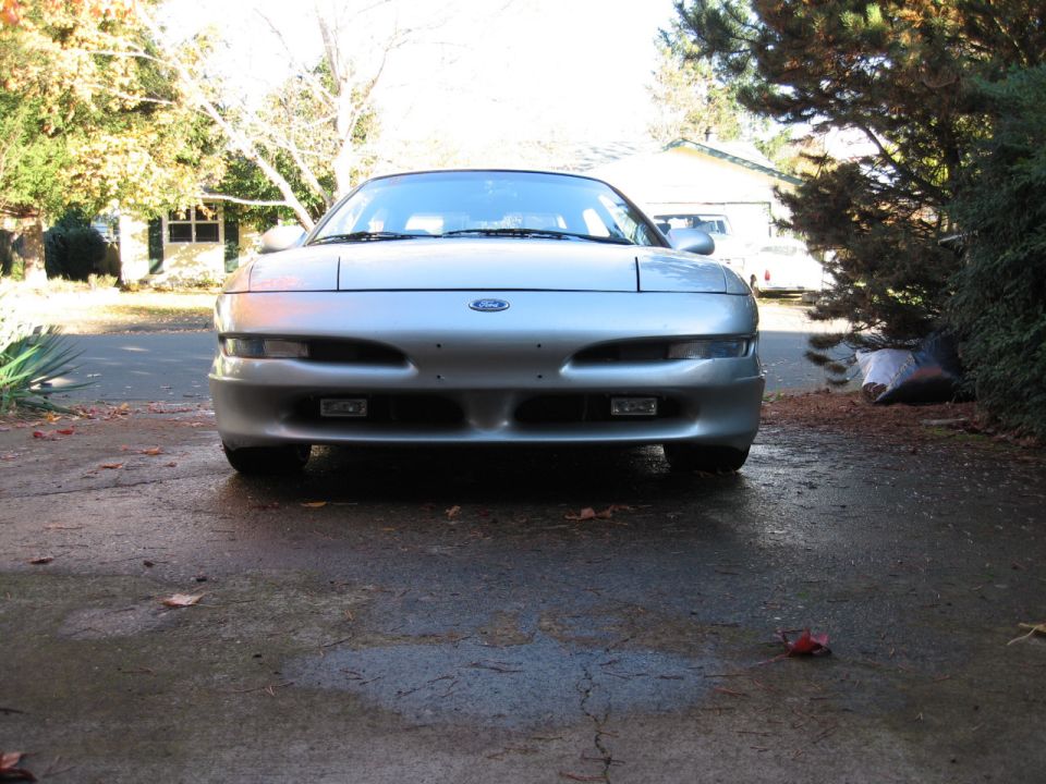 Silver Ford Probe with pop-up headlights and fog lights, viewed from the front