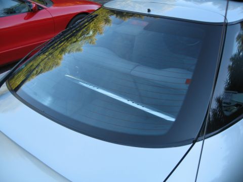 1996 Ford Probe - Rear view of a 1996 Ford Probe, showing the defroster lines and wiper blade.