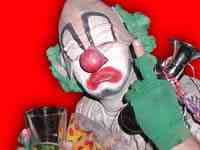 1968 Ford Mustang - A clown with white face paint, red nose, and green wig is shown holding a brass horn and a glass.