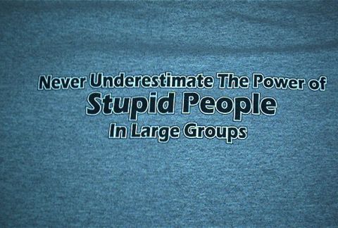 1986 Ford Bronco - T-shirt displays a quote about the power of large groups of people, with a website logo at the bottom.