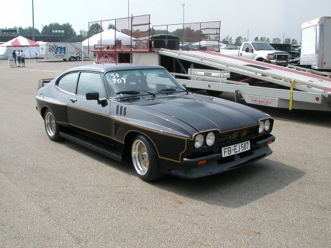 1981 Ford Mustang - This black coupe with gold trim and gold wheels is not a 1981 Ford Mustang, despite the registry claim.