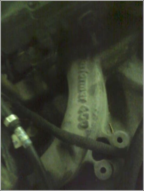 1980 Ford Bronco - Close-up of an engine component showing embossed text, possibly '429 Ford'.
