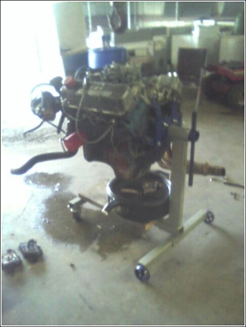 Engine on stand with oil pan below