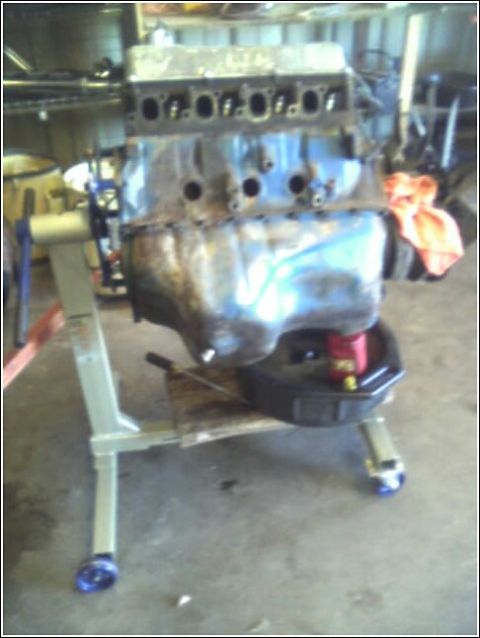 1980 Ford Bronco - Engine block on a stand, ready for work or rebuild.