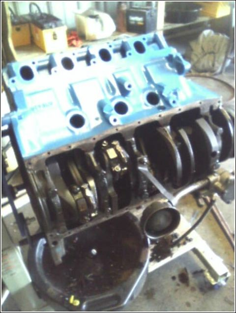 1980 Ford Bronco - Engine block assembly with crankshaft and oil pan.
