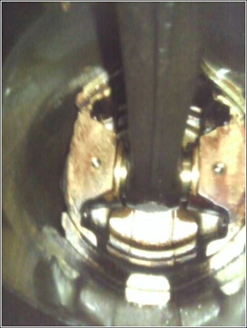 1980 Ford Bronco - This is a close-up view of an engine's internal components, specifically a piston and connecting rod.