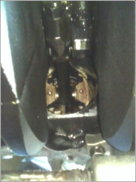 1980 Ford Bronco - Close-up view of internal engine components, including the crankshaft and connecting rods.