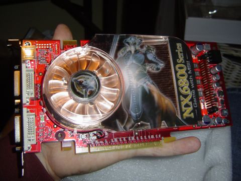 1989 Ford Bronco - MSI NX6800 Series graphics card held in hand.