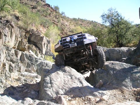 1993 Ford Bronco - This 1993 Ford Bronco is shown tackling a difficult rocky off-road path.