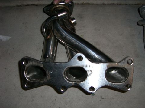 1996 Ford Probe - Aftermarket exhaust manifold, likely for a performance application.