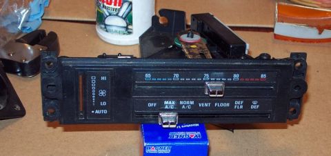 1985 Ford LTD Crown Victoria - A car's climate control panel is shown, with various settings for temperature and fan speed.