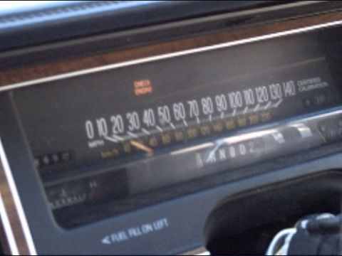 1991 Ford LTD Crown Victoria - The dashboard of a 1991 Ford Crown Victoria LTD shows the speedometer and other indicators.