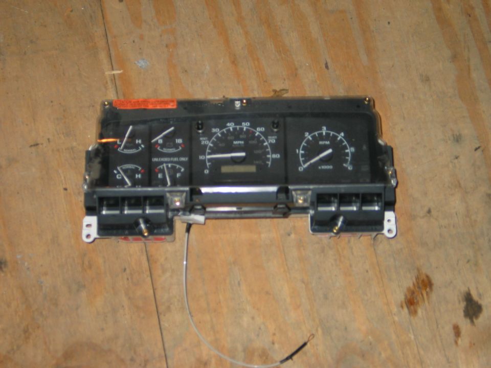 1994 Ford Bronco instrument cluster with speedometer and tachometer