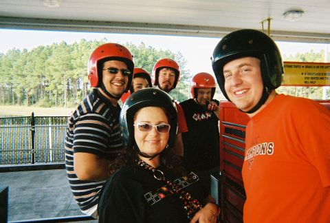 1991 Ford Probe - A group of people wearing helmets are posing for a photo, possibly before an outdoor activity.