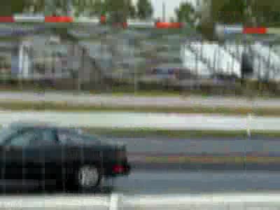 1989 Ford Probe - I lost but was catching up fast just look at how close the signs light up