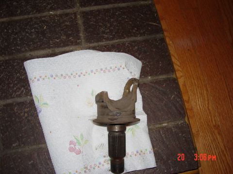 1995 Dodge 1500 - A driveshaft universal joint yoke rests on a paper towel, with a timestamp visible in the lower right corner.