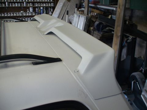 1993 Ford C-350 (Centurion Conversions) - attached with supplied 3M tape, and also added 5 self tapping stainless screws across the top