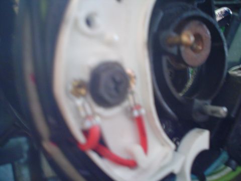 1984 Ford Bronco - This image shows a close-up view of electrical wiring and connections within a vehicle's component.