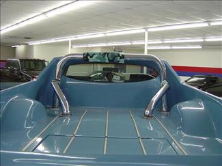 1970 Ford Ranchero - Rear view of a light blue 1970 Ford Ranchero pickup truck with a chrome roll bar.