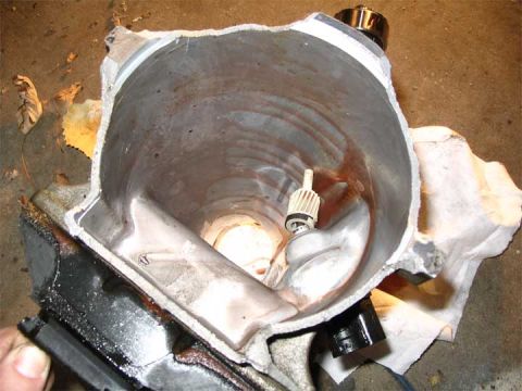 2001 Ford Crown Victoria - That is the tailshaft housing. Its been ripped clear from the transmission. You can see the remains of the rear speed sensor, its bent.