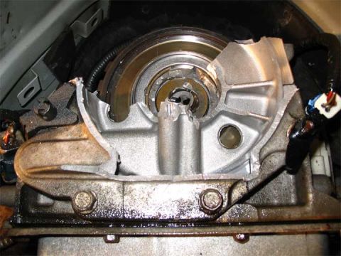 2001 Ford Crown Victoria - This is the rear of the trans still in the car. Notice that the top half of the housing is just gone.