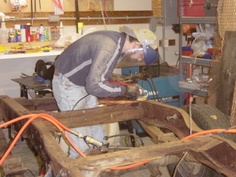 1991 Ford Bronco - Cleaning up around the #4 crossmember to patch the damage around those two body mounts. In between 11/10 and this picture (11/20), we spent…