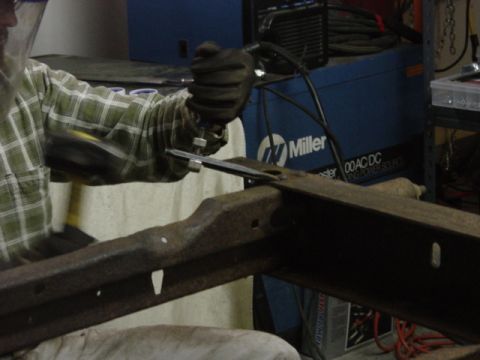 1991 Ford Bronco - My aim's not really that bad, that's on the backswing. My prescription for frame rivet removal -- undercut the head as much as you can with…