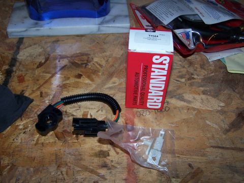 1986 Ford Bronco - Standard TH44 carburetor sensor with wiring harness and mounting hardware, likely for a Ford vehicle.