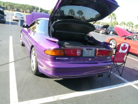 1993 Ford Probe - Rear view of a purple 1993 Ford Probe GT, showing its 'PROBE GT' badging and license plate.