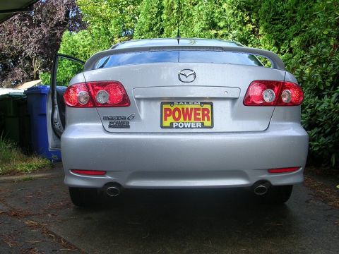 2004 Mazda 6 - Rear view of a silver 2004 Mazda 6 sedan, a spoiler and a 'POWER' license plate.