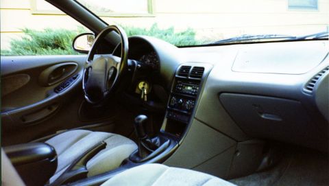 1996 Ford Probe - Interior view of a 1996 Ford Probe, highlighting the dashboard and seating.