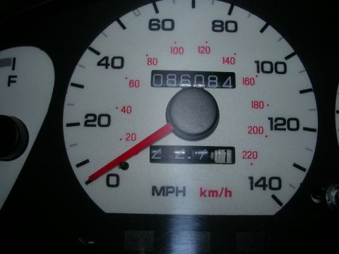 1996 Ford Probe - The odometer reads 8608.4 miles, with the fuel gauge showing empty.