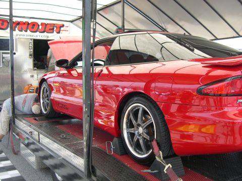 1997 Ford Probe - Red 1997 Ford Probe undergoing testing on a dynamometer.