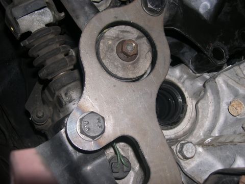 1997 Ford Probe - This photo shows a close-up view of a vehicle's clutch slave cylinder assembly.
