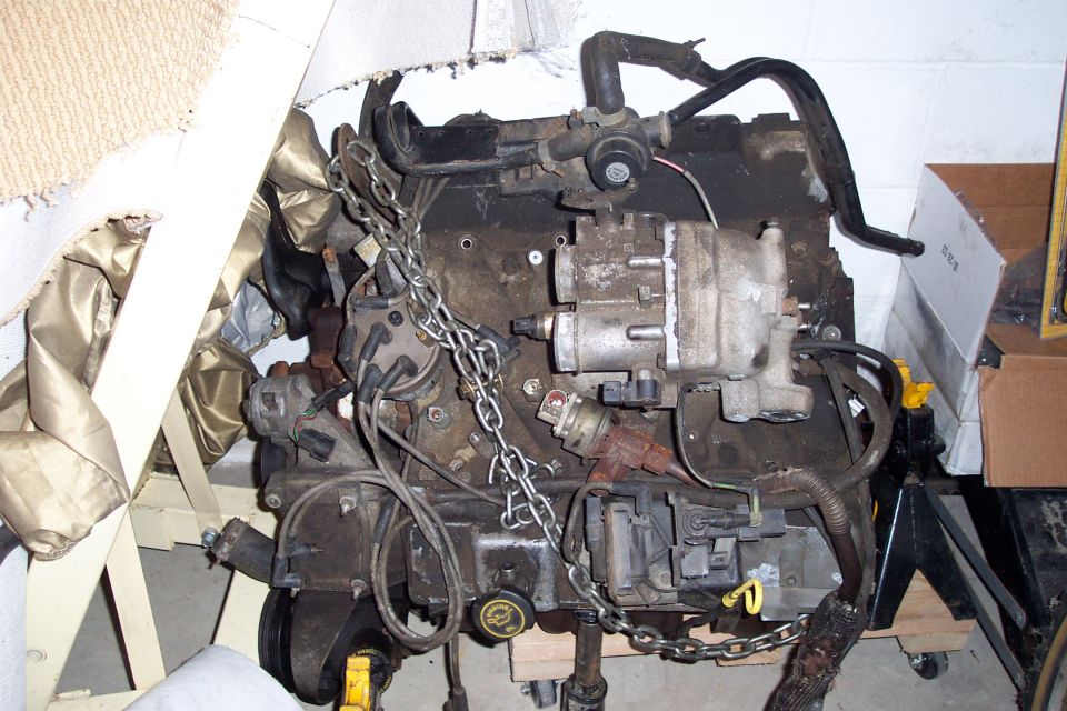 Engine on a stand, with chains attached