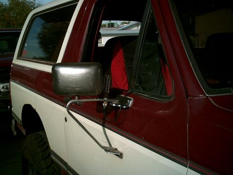 1988 Ford Bronco - Side view of a 1988 Ford Bronco showing the mirror and a CB antenna mount.
