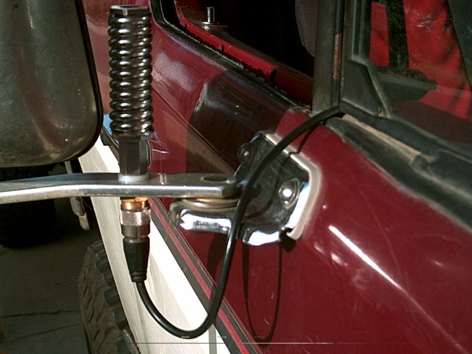 1988 Ford Bronco door frame with CB antenna mount and coiled cable