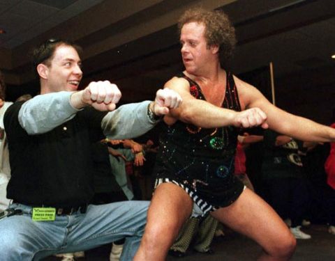 1991 Ford Bronco - Two men are engaged in a martial arts pose, possibly during a demonstration or class.