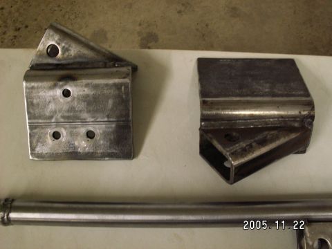 1991 Ford Explorer - Fabricated metal brackets and a tube, possibly for a suspension modification.