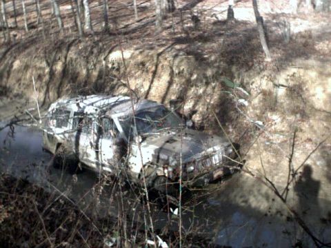 1996 Ford Bronco - This Guy was having a bad day. Took 2 jeeps to pull him out of the secound hole of the trench. He had just finished changing a flat. When h…