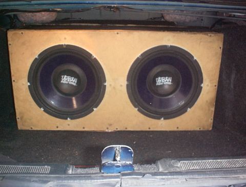 1993 Ford Taurus - A pair of subwoofers are installed in the trunk of a car.