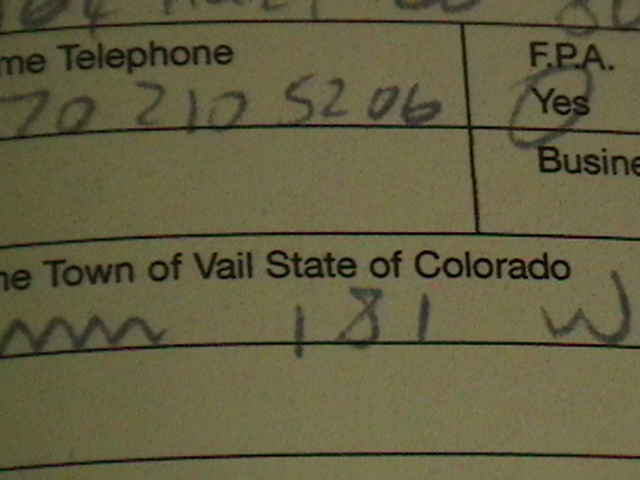 Document with handwritten text and printed fields, including 'Town of Vail State of Colorado'