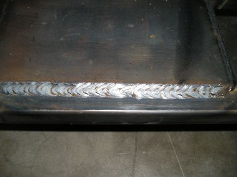 1993 Ford Bronco - A detailed view of a metal frame section, highlighting the welded seam and its texture.