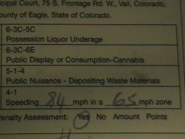 Court document detailing speeding violation, 84 mph in a 65 mph zone