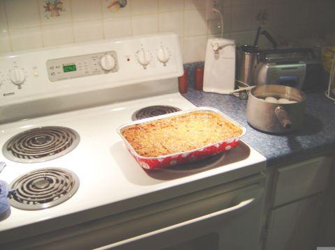 1986 Ford Bronco - Kitchen scene with a casserole dish on the stove and a pot of boiled eggs.