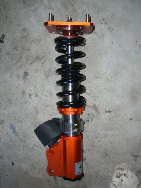 1996 Ford Probe - Adjustable coilover suspension assembly, likely for aftermarket performance tuning.