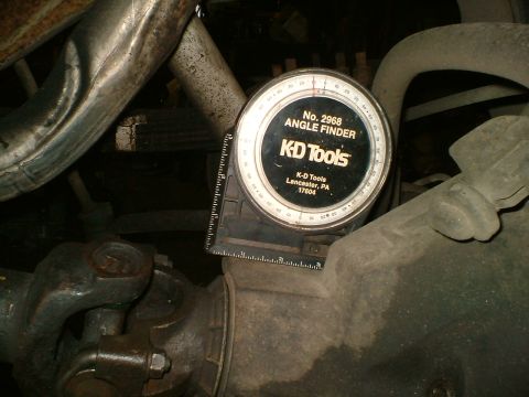 1989 Ford Bronco - KD Tools angle finder is used to measure the rear axle assembly.