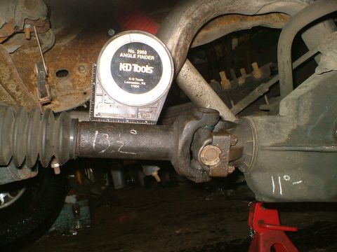1989 Ford Bronco - Using an angle finder on the driveshaft during rear end work.